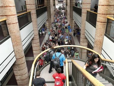 Students file through the halls of Allen High School, where the campus stretches almost a quarter of a mile.
