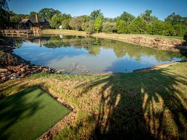 Golf tee, water hazard and green at 5101 Kensington Ct., in Flower Mound, Texas on August...