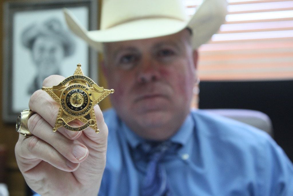 Denton County Sheriff Tracy Murphree holds up the new sheriff's office badge on Wednesday in...