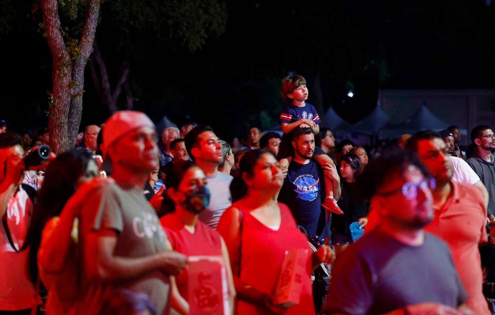 People watches the fireworks during an Independence Day celebration on Monday, July 4, 2022...
