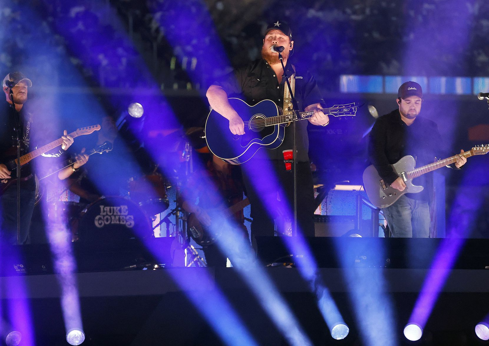 Country artist Luke Combs performs during the halftime show at AT&T Stadium in Arlington, November 25, 2021. The Dallas Cowboys were facing the Las Vegas Raiders in the Thanksgiving Day game. (Tom Fox/The Dallas Morning News)