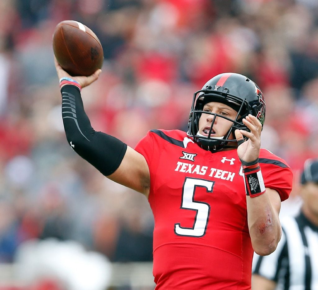 Texas Tech's Patrick Mahomes (5) passes the ball during an NCAA college football game...