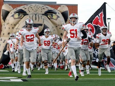 The Lovejoy Leopards enter the field to face Prosper Rock Hill in a District 7-5A high school football game played at the Children's Health Stadium on Friday, Oct. 1, 2021, in Prosper.