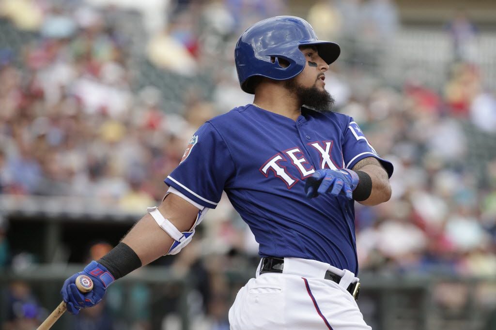 Texas Rangers' Rougned Odor bats during the second inning of a spring training baseball game...
