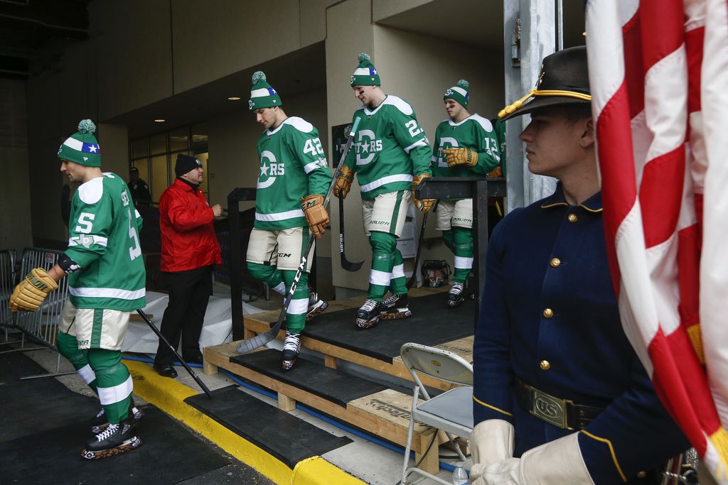 The Dallas Stars exit the locker room for warm ups prior to a NHL Winter Classic matchup...
