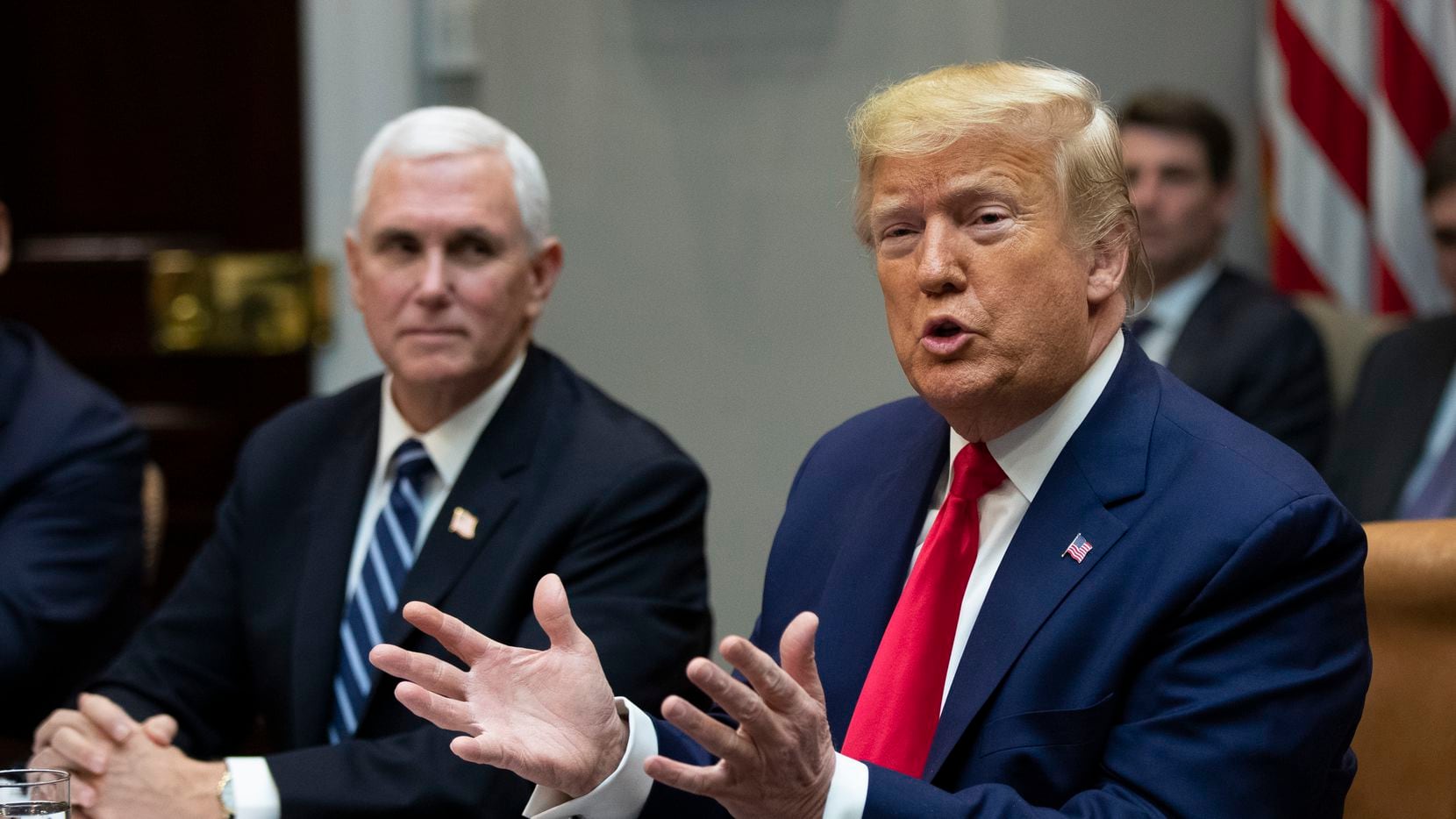President Donald Trump with Vice President Mike Pence, speaks during a coronavirus briefing with Airline CEOs in the Roosevelt Room of the White House, Wednesday, March 4, 2020, in Washington. (AP Photo/Manuel Balce Ceneta)