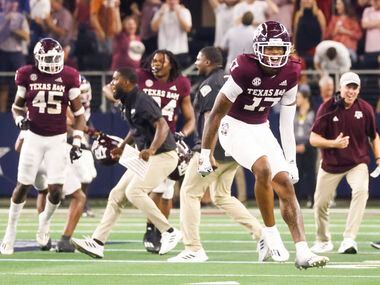 Texas A&M players celebrate as Arkansas misses to score a field goal during the last minute...