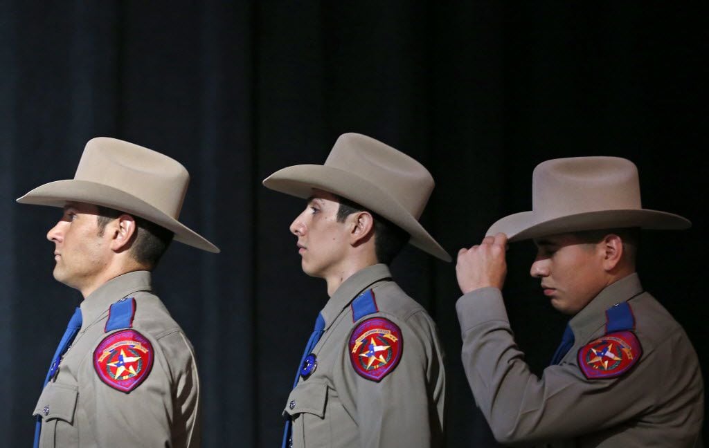 Recruits of Texas Department of Public Safety Alex Amador left), Osvaldo Anzaldua (center)...