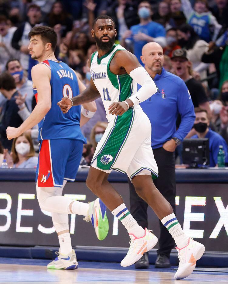 Dallas Mavericks forward Tim Hardaway Jr. (11) looks over his shoulder after making a three-pointer during the fourth quarter against the Washington Wizards at the American Airlines Center in Dallas, November 27, 2021. (Tom Fox/The Dallas Morning News)