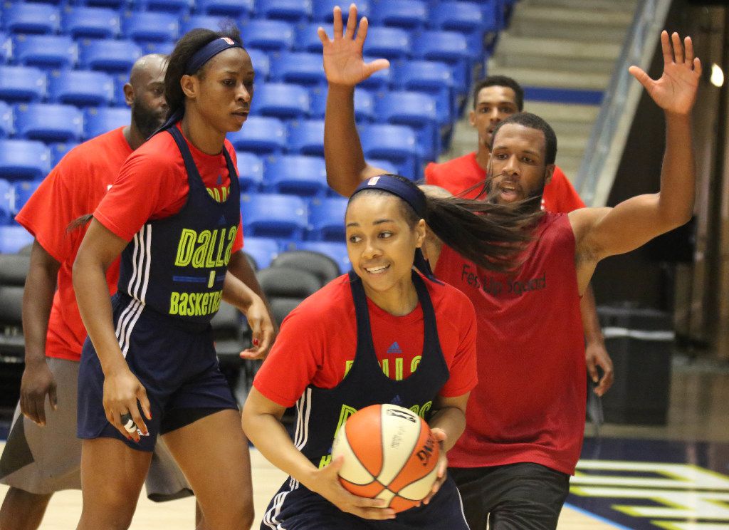 Dallas Wings guard Allisha Gray, center, is pictured during Dallas Wings training camp at...