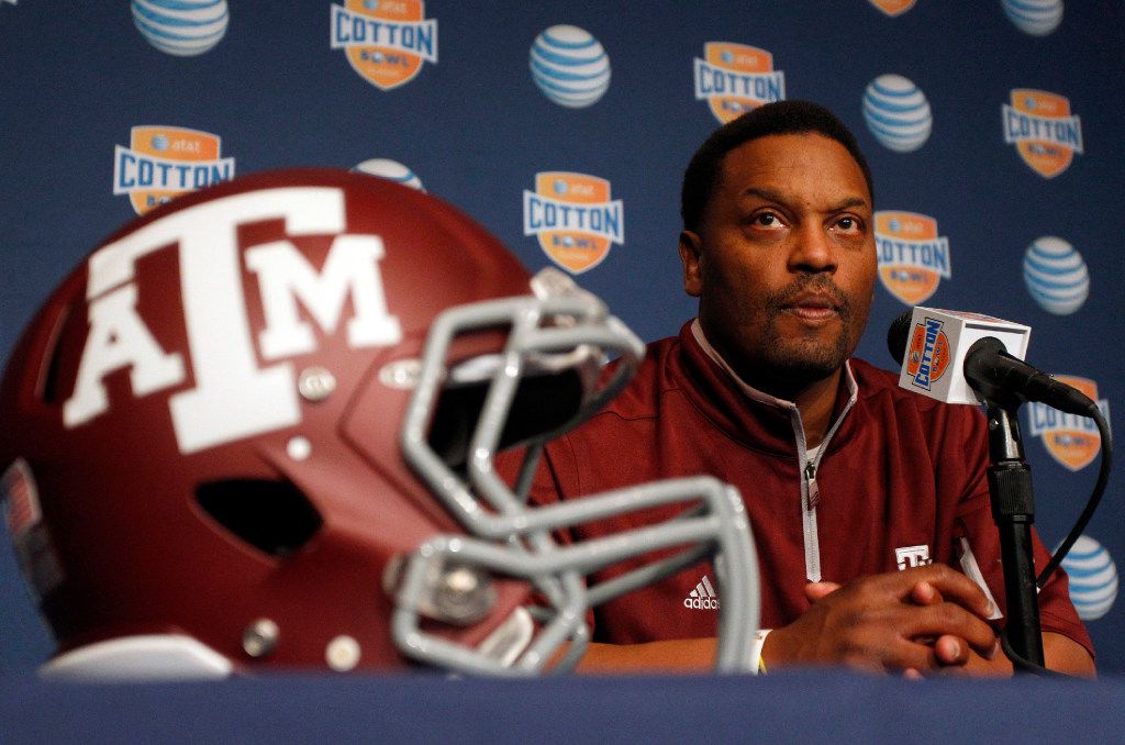 Texas A&M Aggies head coach Kevin Sumlin answers questions from the media during the Cotton...