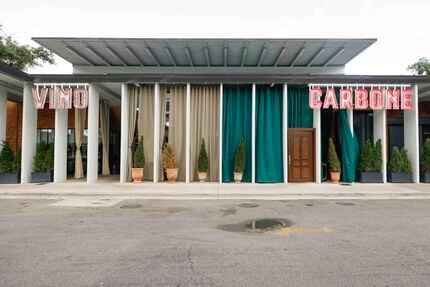 Carbone, seen here from the front of the restaurant, has a sibling eatery next door named...