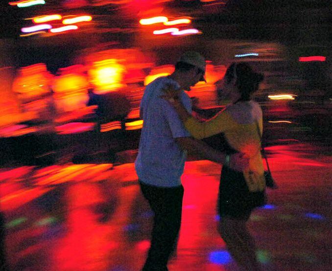A couple takes a spin around the dance floor at Rockin Rodeo in Denton. 