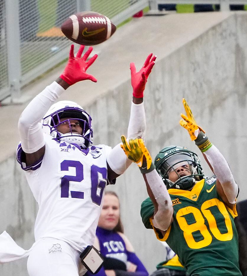 TCU safety Bud Clark (26) intercepts a pass intended for Baylor wide receiver Monaray...