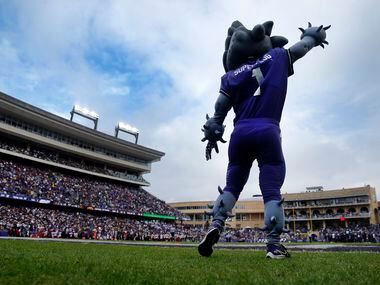 TCU Horned Frogs mascot Superfrog cheers his team as they face the Iowa State Cyclones at...