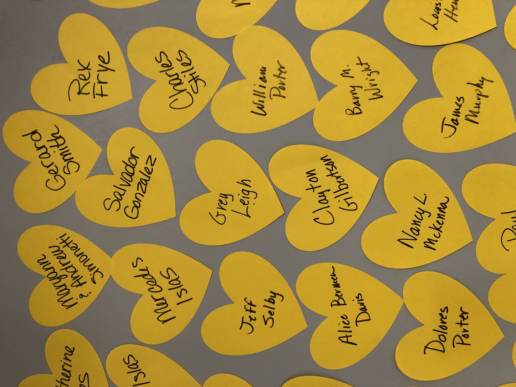 People are sending yellow hearts to recognize loved ones who have died from COVID-19.