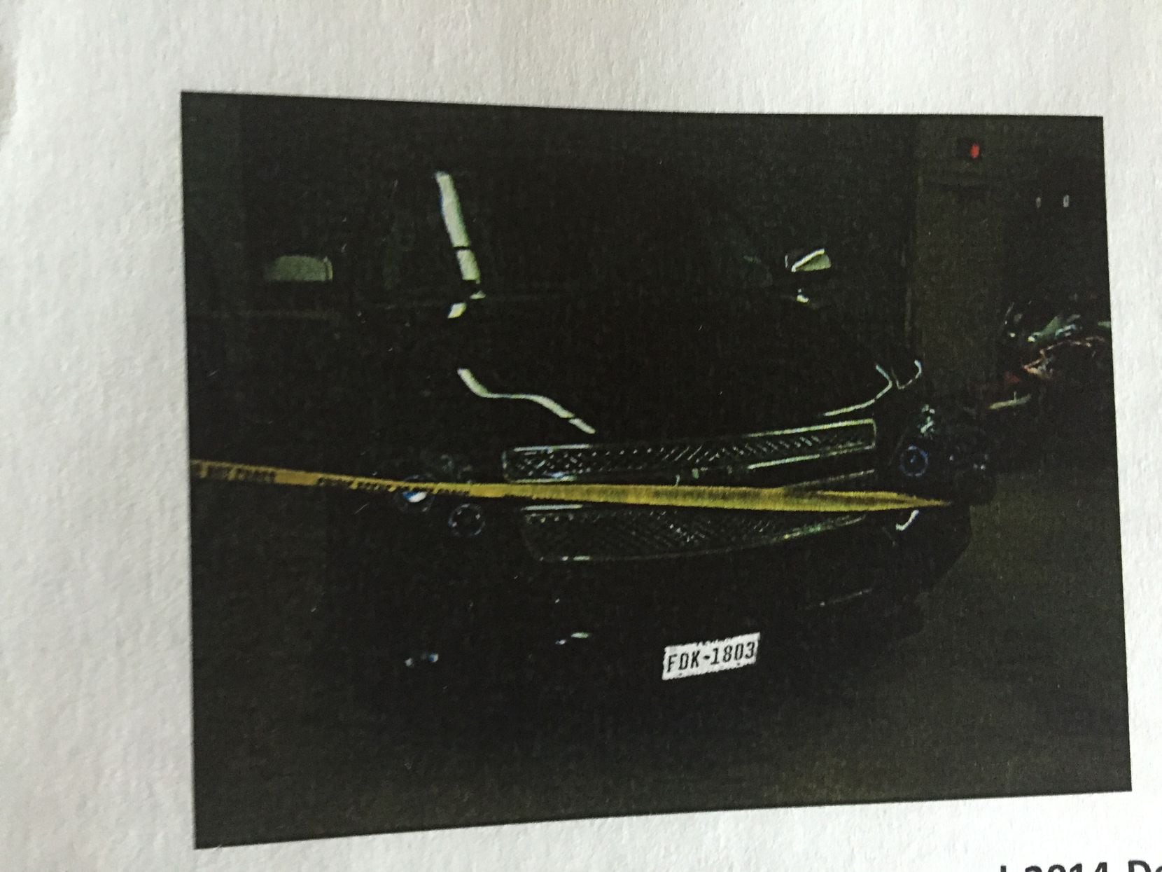  Police tape ropes off the Chevrolet Tahoe that ex-Farmers Branch officer Ken Johnson drove...