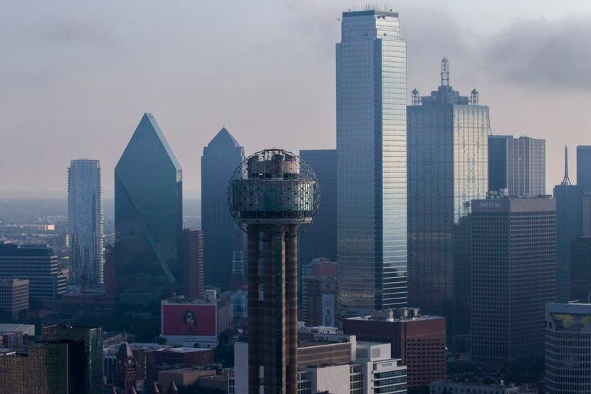 Reunion Tower and downtown Dallas, including the Bank of America Tower (center right) and...