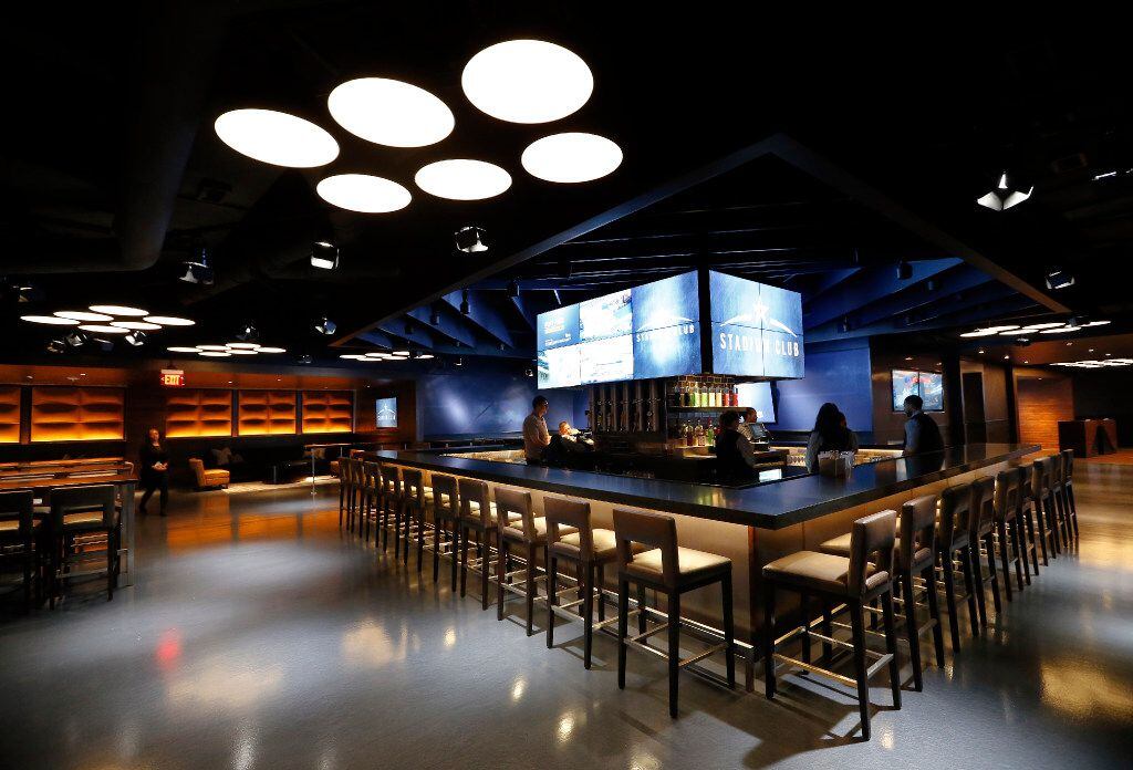 The front bar area is pictured at the new Stadium Club restaurant in AT&T Stadium, Friday,...