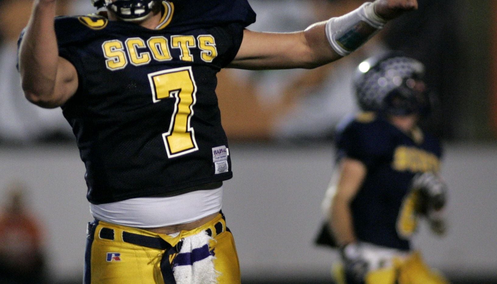 Highland Park QB Matthew Stafford celebrates a Scots touchdown with just over three minutes...