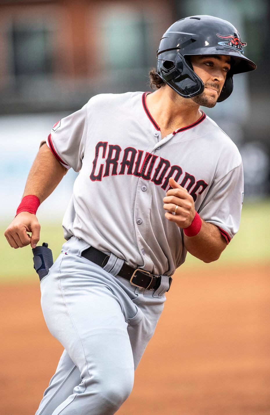 Hickory Crawdad's Josh H. Smith (12) jogs around the bases after hitting a homerun at his first at bat during the game with the Greensboro Grasshopper's at First National Bank Field on Friday, August 6, 2021 in Greensboro, N.C. (Woody Marshall/Special Contributor)