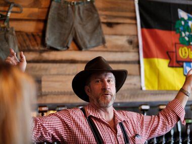Cofounder Greg McCarthy points out his family Lederhosen at Legal Draft Beer Co. in...
