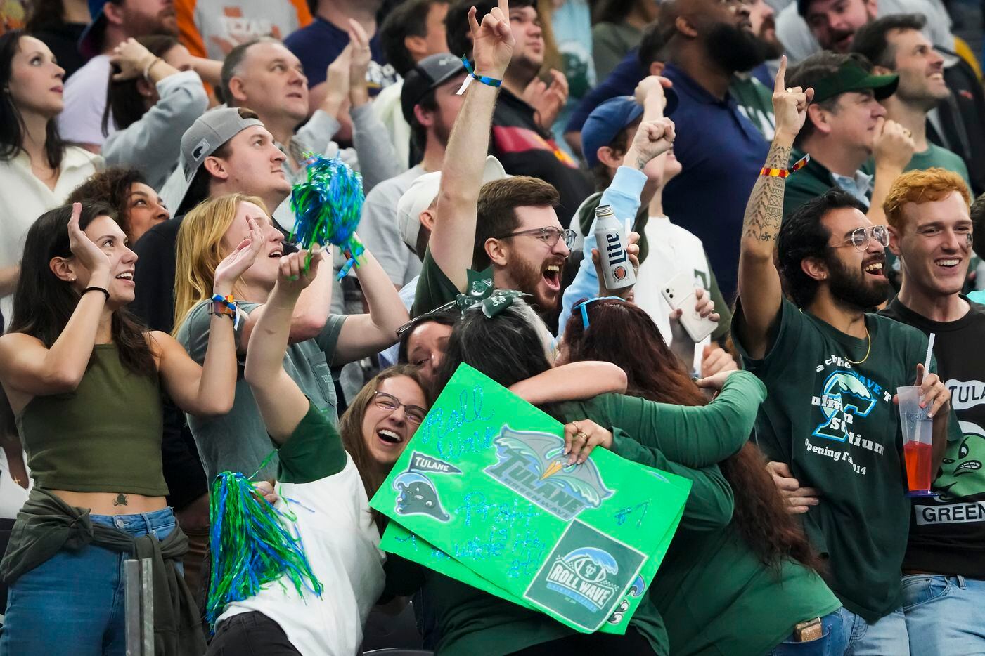 Tulane fans celebrate a Green Wave touchdown during the first half of the Cotton Bowl NCAA...