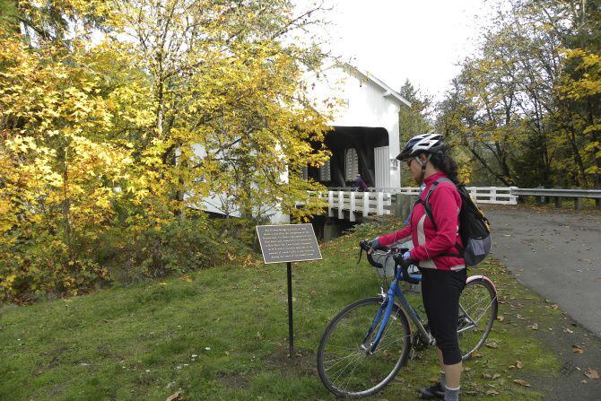 The Dorena covered bridge, a picturesque stop along a bicycle trail, is also a popular...