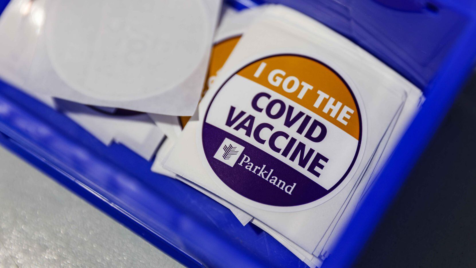 COVID vaccine stickers where the Pfizer-BioNTech COVID-19 vaccine is administed at Ellis...