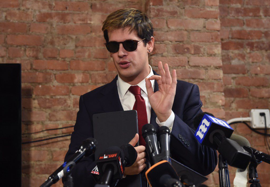 Milo Yiannopoulos speaks at a press conference in February, announcing his resignation...