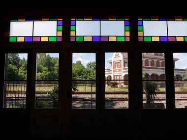 The Texas Pacific Museum is framed by the window of the historic Ginocchio Hotel in...