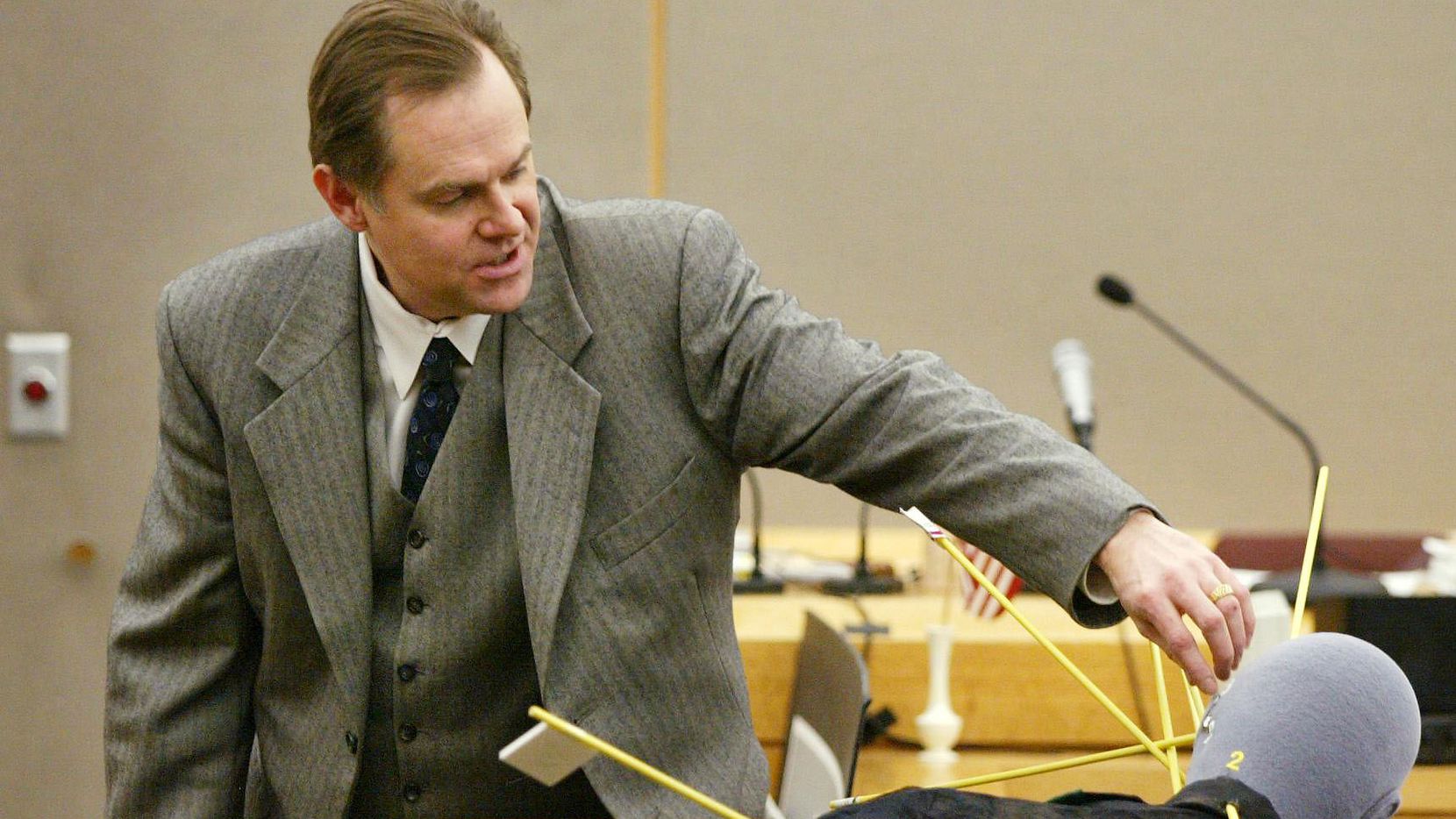 Dr. Jeffrey Barnard testifies during the January 2002 murder trial of "Texas 7" escapee Donald Newbury about the gunshot wounds that killed Irving police Officer Aubrey Hawkins on Christmas Eve 2000. Newbury was sentenced to death and was executed in February 2015.