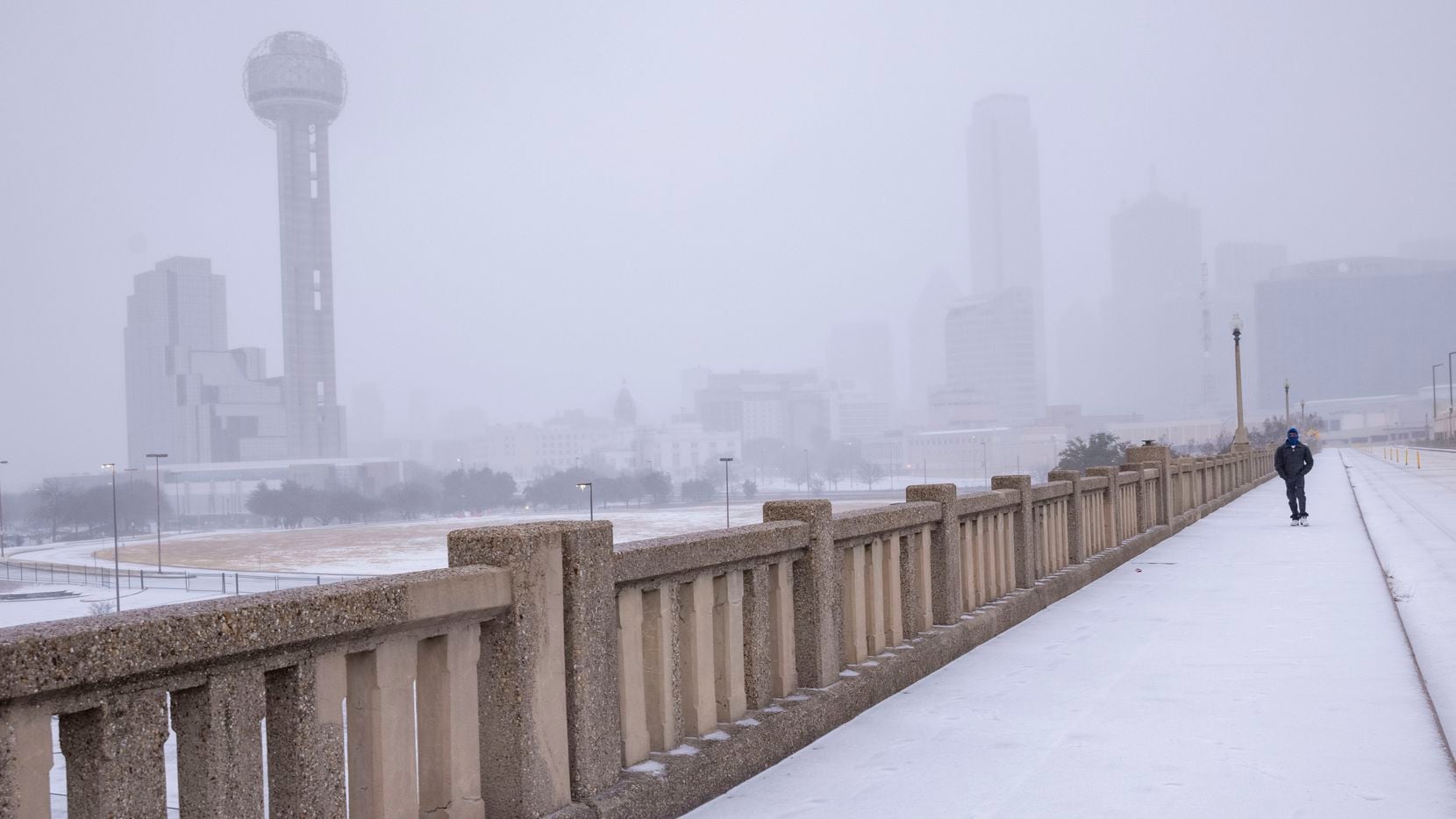A view of downtown from the Houston St Viaduct as sleet falls on Thursday, Feb. 3, 2022, in...