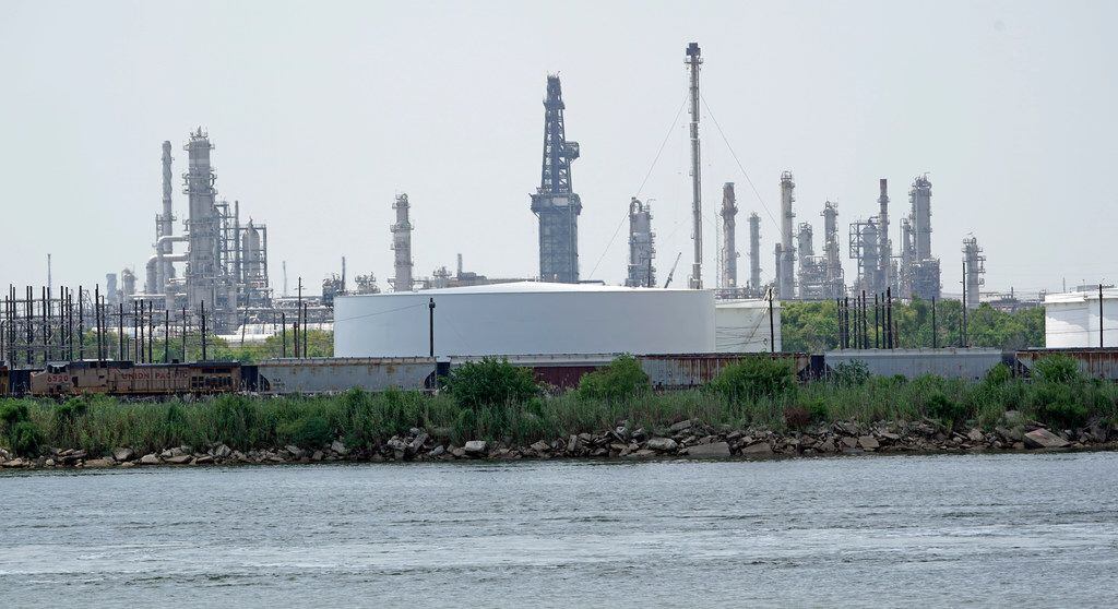 Storage tanks at a refinery along the waterway are shown in Port Arthur, Texas. 