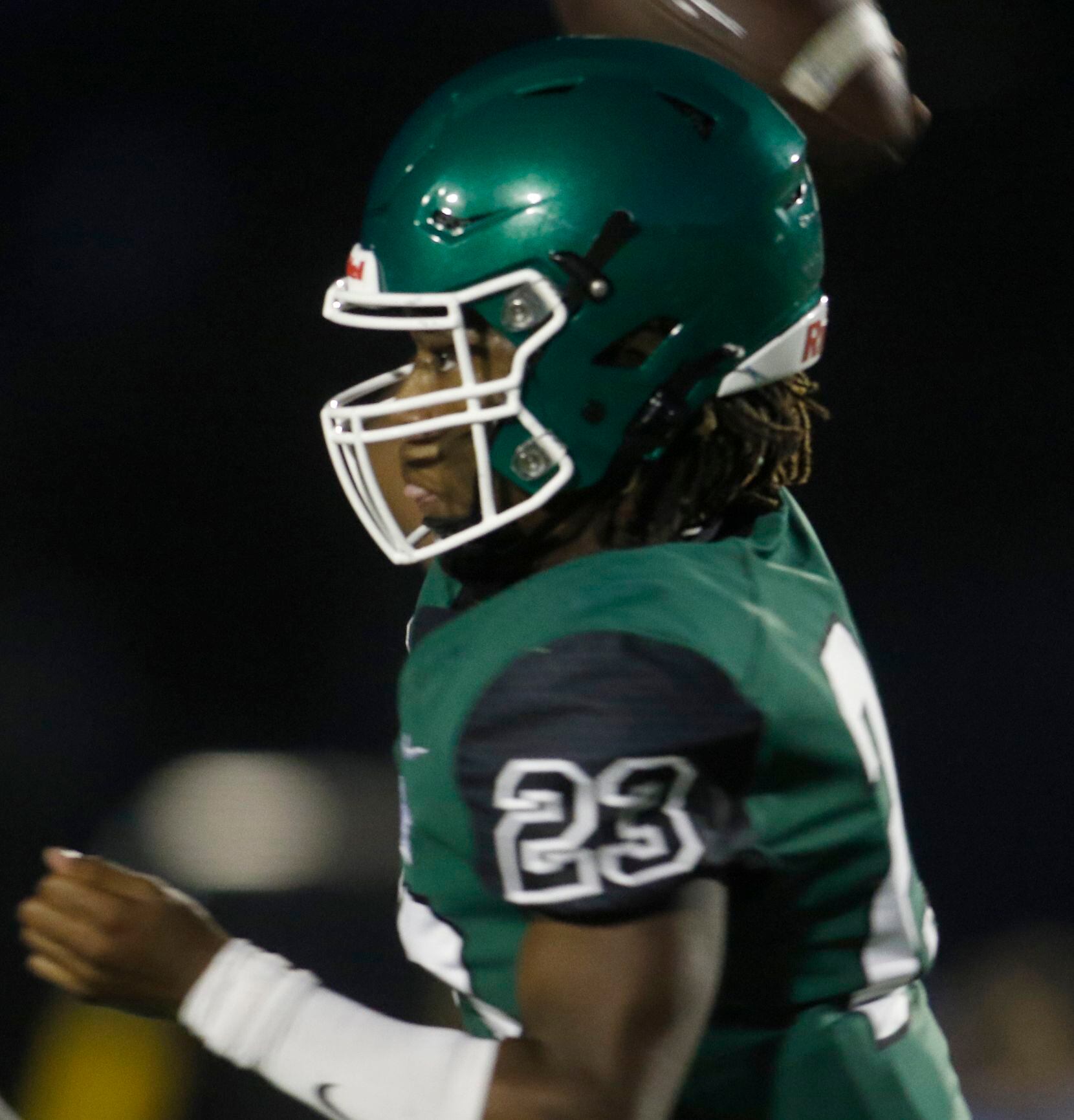 Kennedale quarterback Jeremiah Myers (23) launches a pass downfield during first half action...