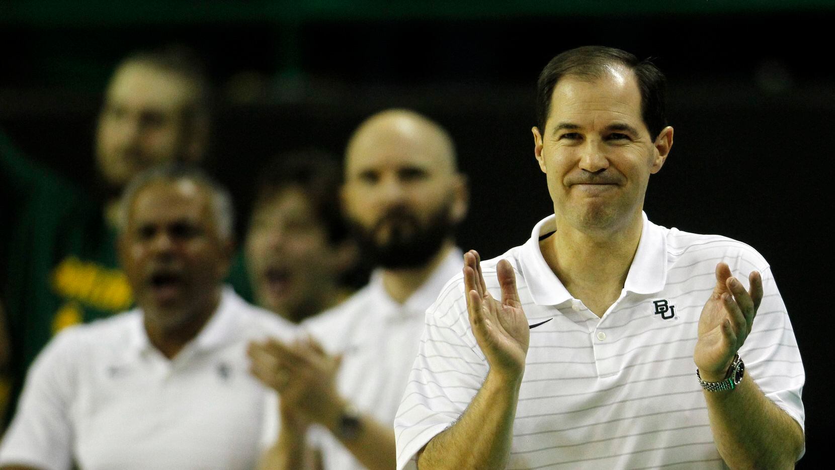 Baylor head coach Scott Drew applauds his players during first half action against Alcorn...