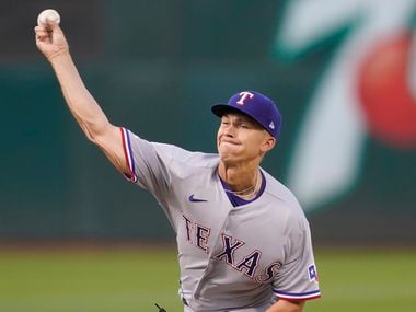 Texas Rangers' Glenn Otto pitches against the Oakland Athletics during the first inning of a...