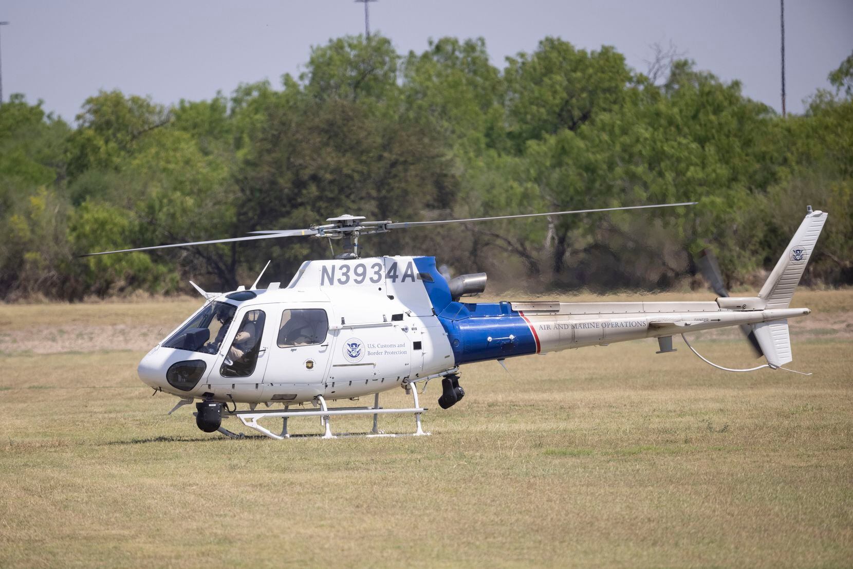 A U.S. Customs and Border Protection helicopter lands at Anzalduas Park, on April 13, 2022,...