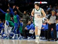 Dallas Mavericks guard Luka Doncic (77) celebrates a three-pointer during the fourth quarter against the Memphis Grizzlies at the American Airlines Center on Sunday, Jan. 23, 2022 in Dallas. The Mavericks defeated the Grizzlies 104-91.