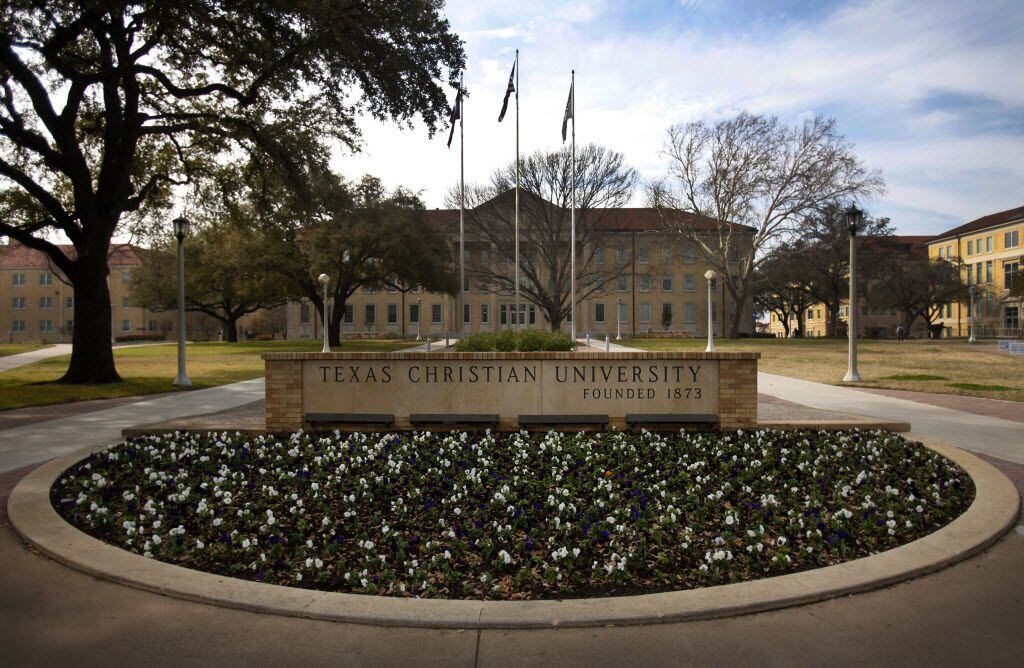 The Texas Christian University sign greets visitors and students to campus in front of M.E....