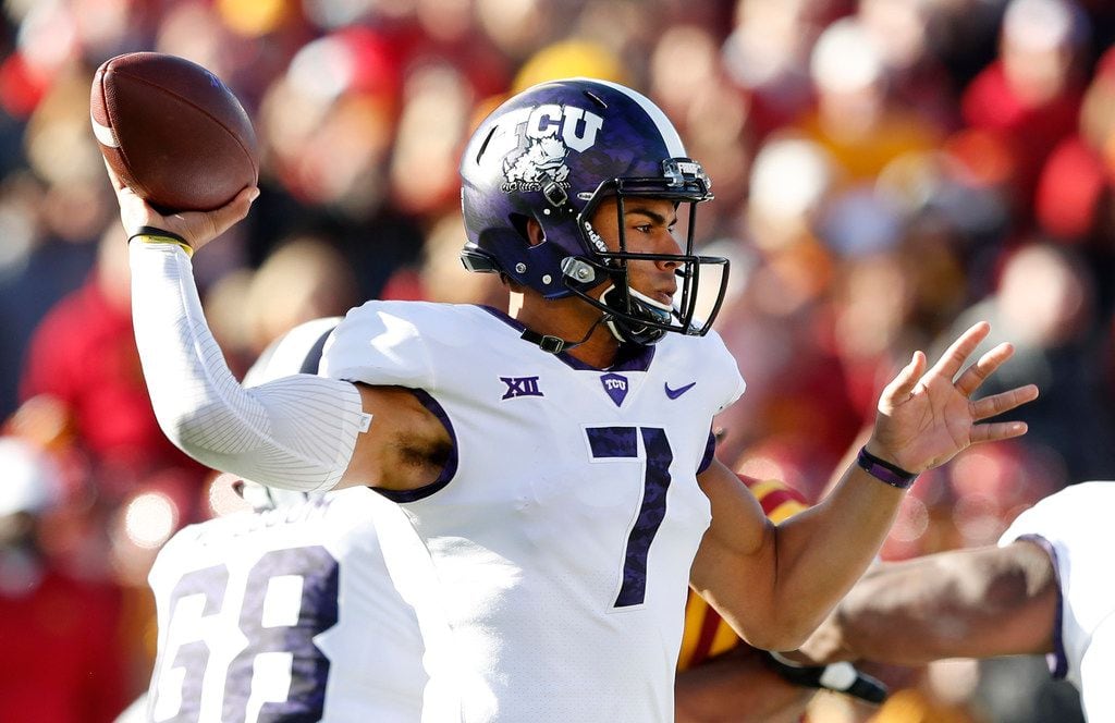TCU quarterback Kenny Hill throws a pass during the first half of an NCAA college football...