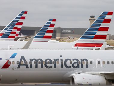 American Airlines planes parked at Terminal D at DFW Airport, Wednesday, October 21, 2020. (Brandon Wade/Special Contributor)