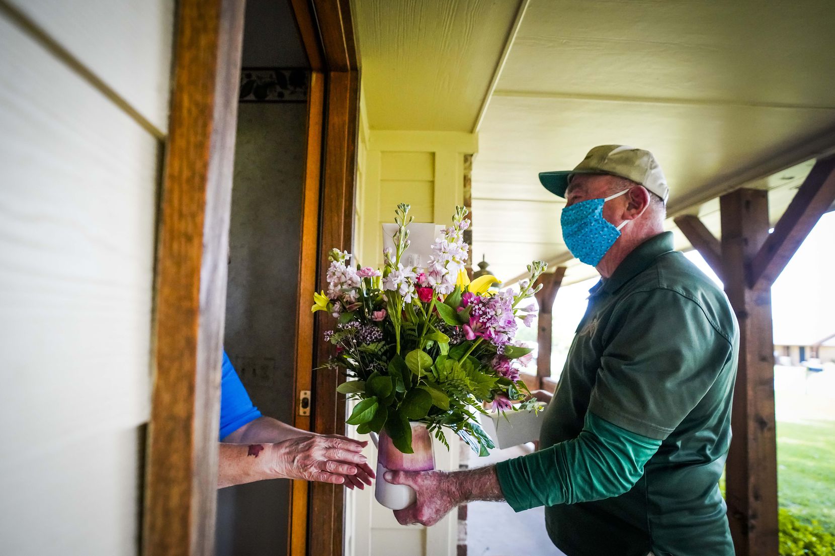 Emmett Conoly of McShan Florist makes a Mother’s Day delivery in Heath. Conoly, who spent 32...