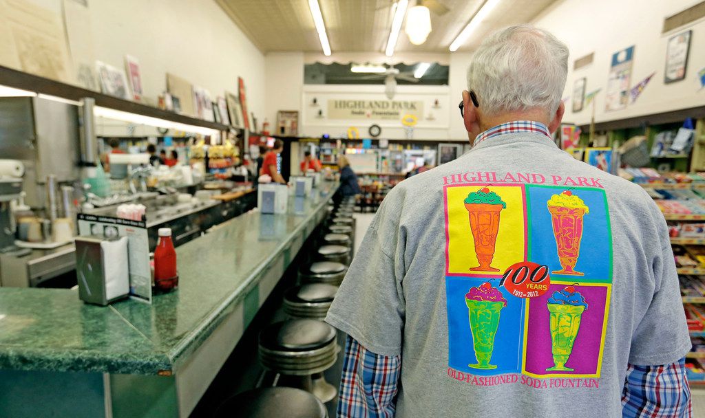 Owner Sonny Williams wears a colorful T-shirt as he works at the Highland Park Soda Fountain...