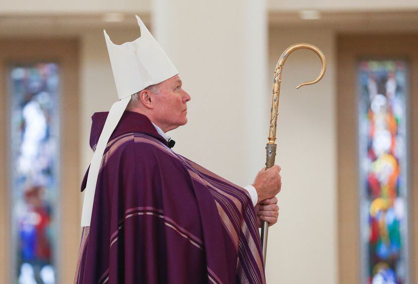 Bishop Edward J. Burns leads a Ceremony of Sorrow on Tuesday, Oct. 9, 2018 at St. Cecilia...