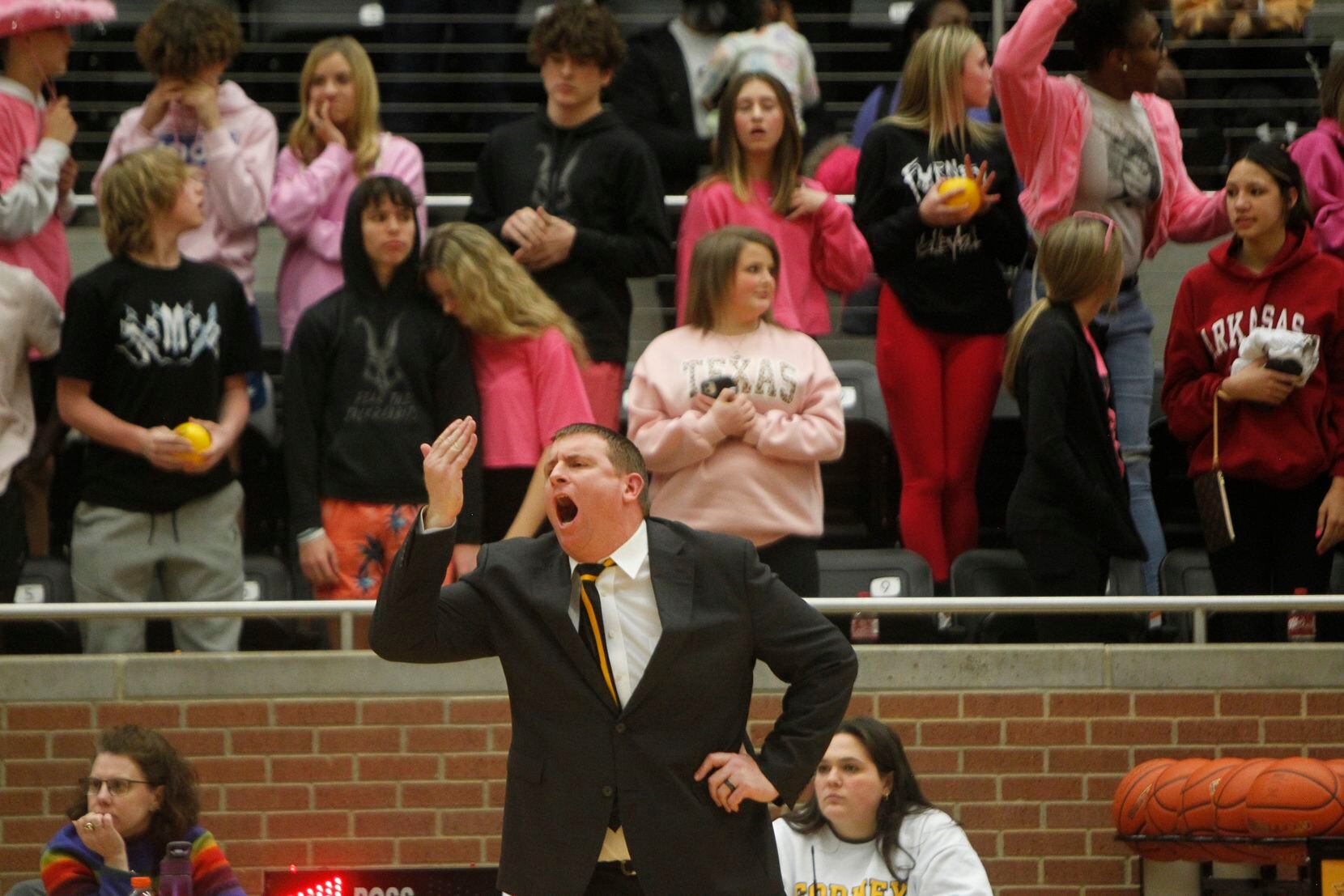 Forney head coach Bart Holloway reacts to the lack of a call during overtime of their 76-74...