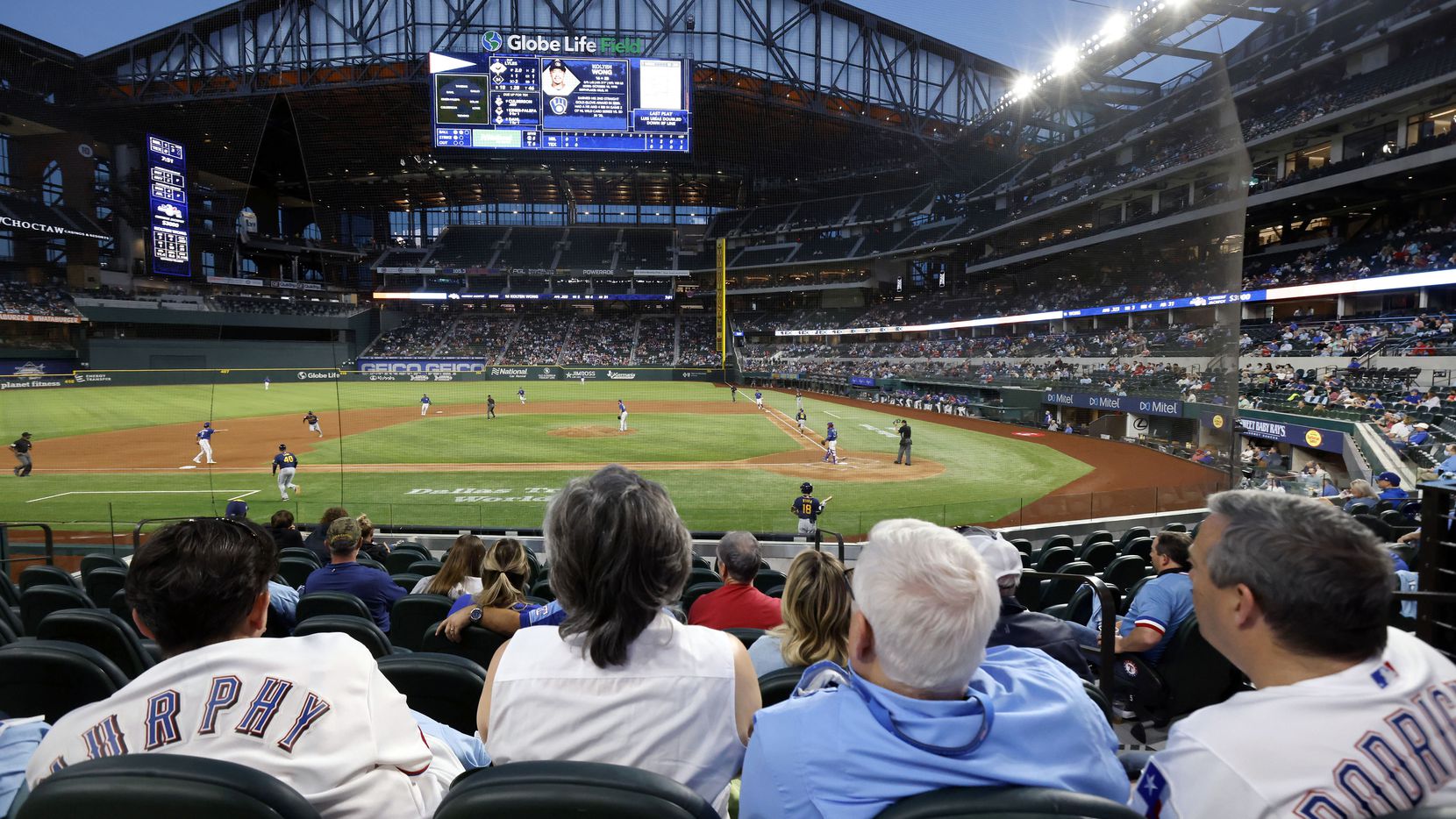 Texas Rangers fans for the first time take in an evening exhibition game at Globe Life Field in Arlington, Texas. The Rangers were playing the Milwaukee Brewers in an exhibition game, Monday, March 29, 2020.
