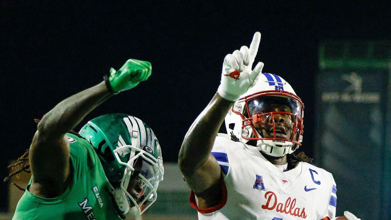 SMU wide receiver Rashee Rice (11) celebrates a touchdown catch in the end zone ahead of UNT...