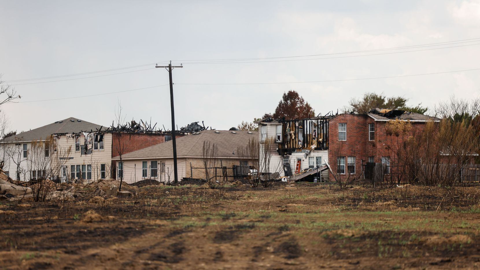 Destroyed houses by a grass fire in Balch Spring on Wednesday, August 10, 2022. The incident...