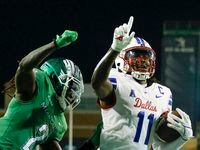SMU wide receiver Rashee Rice (11) celebrates a touchdown catch in the end zone ahead of UNT...
